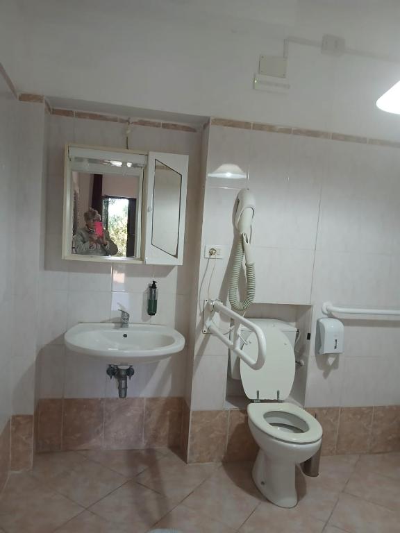 Koupelna v ubytování Hotel Dory