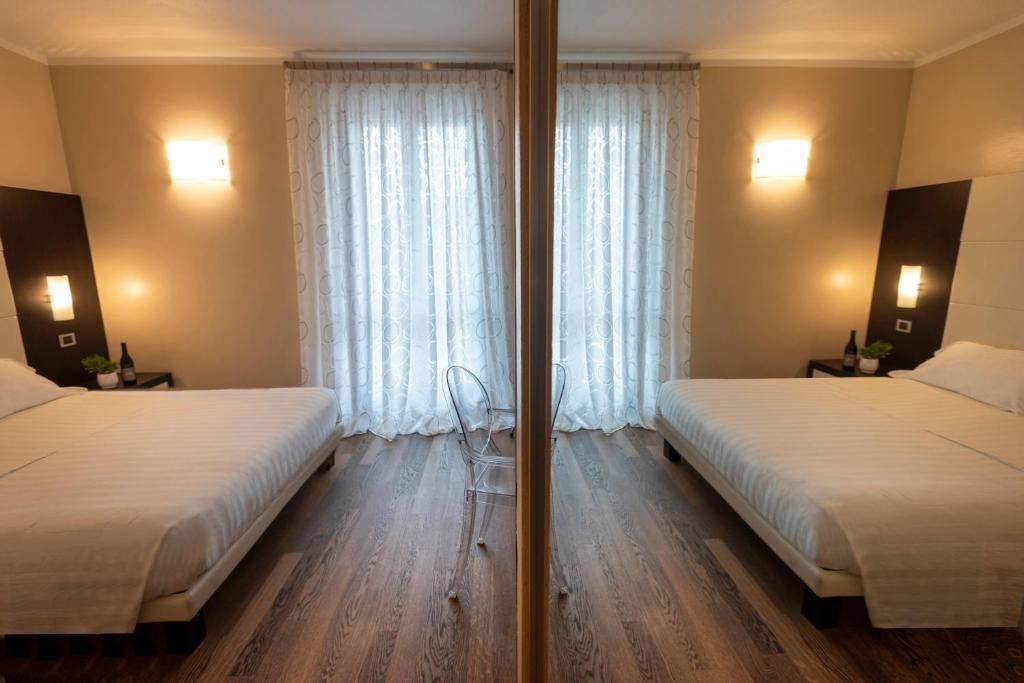 Postel nebo postele na pokoji v ubytování Casa Boffa