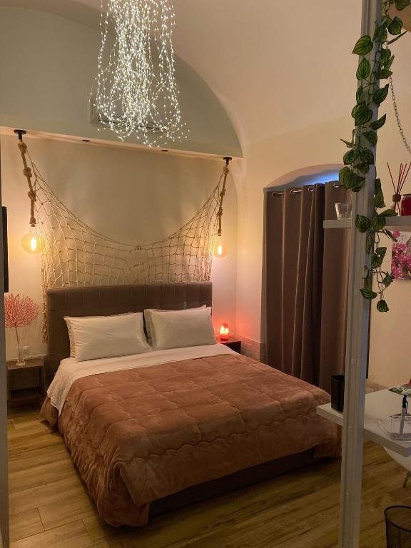 A bed or beds in a room at Cà de Mess