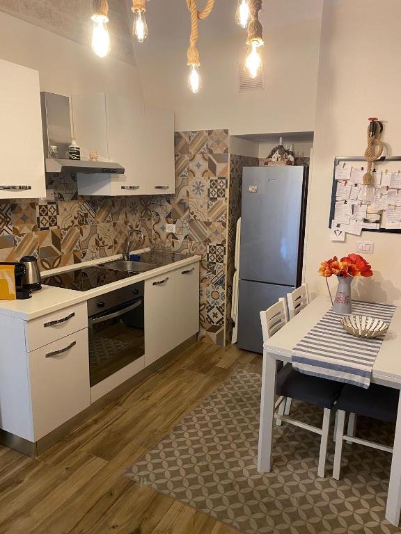 A kitchen or kitchenette at Cà de Mess