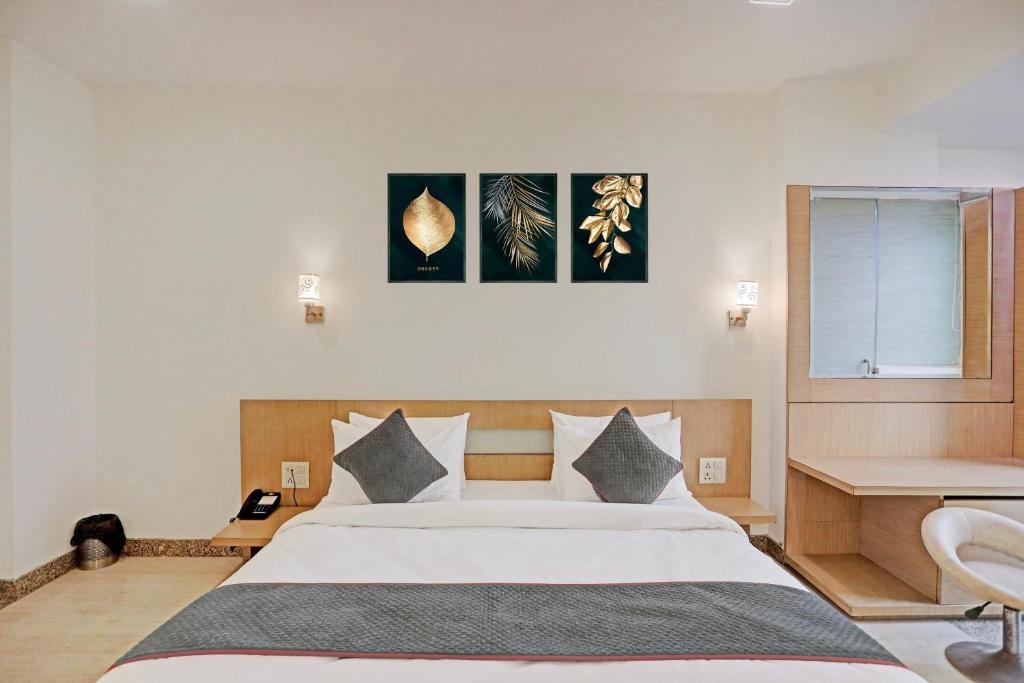 Postel nebo postele na pokoji v ubytování Super Townhouse RELAX SUITS A BOUTIQUE HOTEL VASUNDHARA