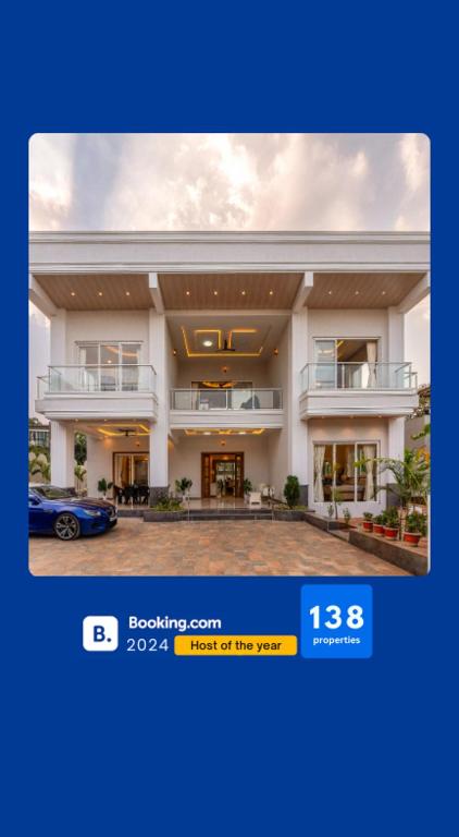 a house with a car parked in front of it at EKOSTAY - Azure Villa in Lonavala