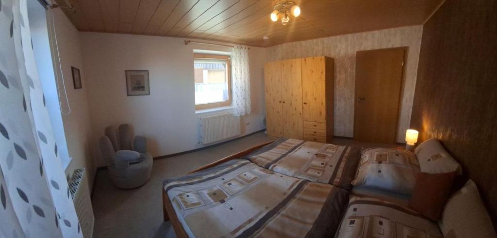 Postel nebo postele na pokoji v ubytování Ferienwohnung Uschkereit