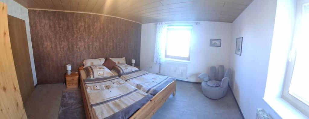 Postel nebo postele na pokoji v ubytování Ferienwohnung Uschkereit