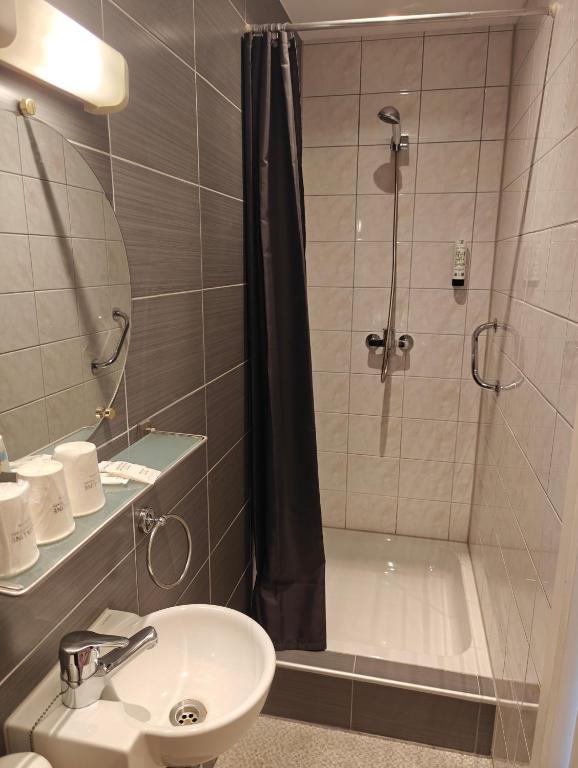 Koupelna v ubytování Hotel Tropicana