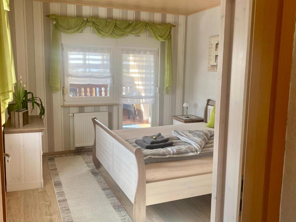 Postel nebo postele na pokoji v ubytování Ferienwohnung „Thea“