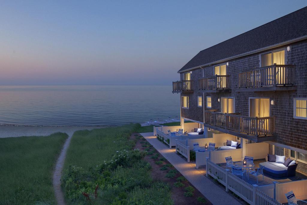 an aerial view of a hotel with the ocean at Ocean Mist Hotel in Yarmouth