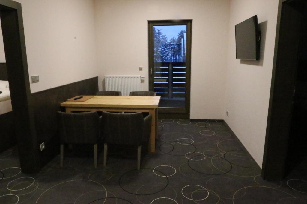 TV a/nebo společenská místnost v ubytování Apartment Hotel Orion
