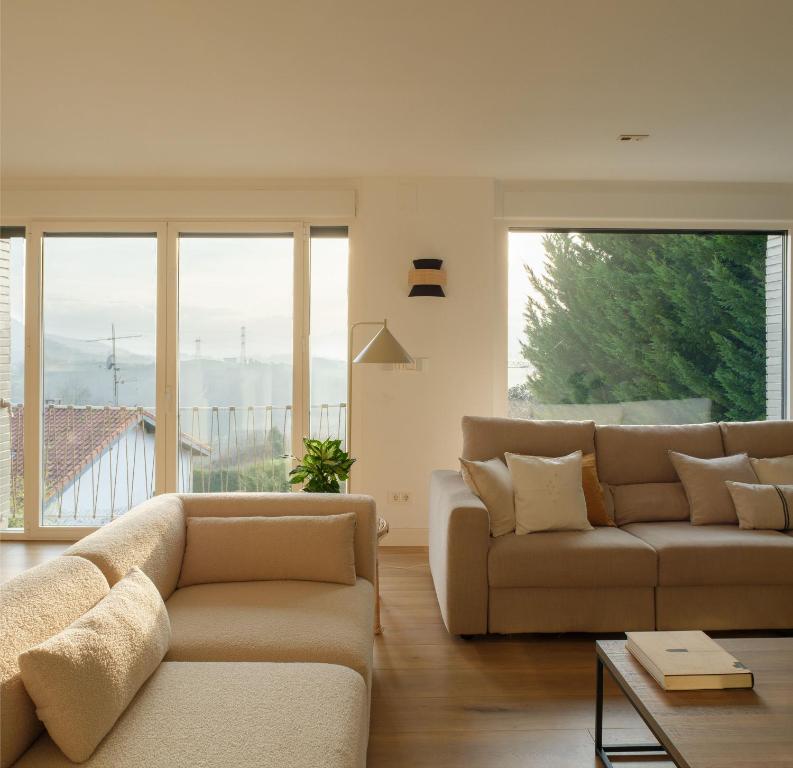 Posedenie v ubytovaní Areitio etxea - casa con jardin