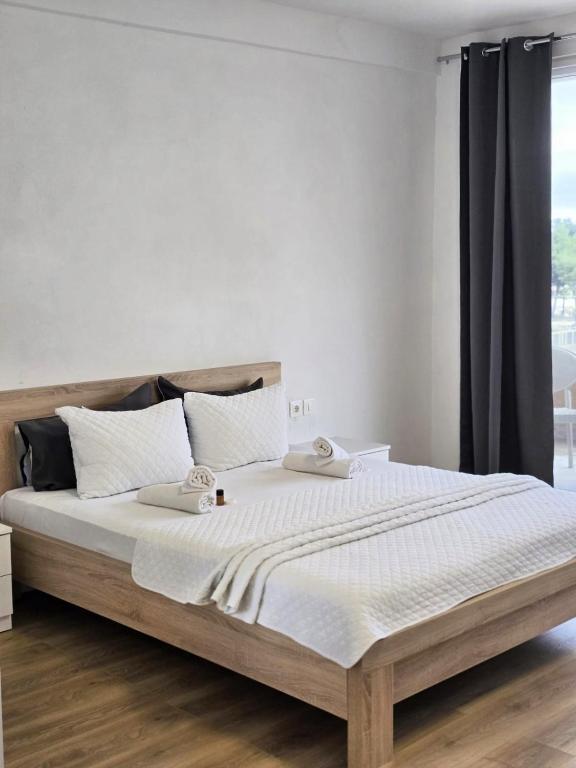 Letto o letti in una camera di Rosa Negra
