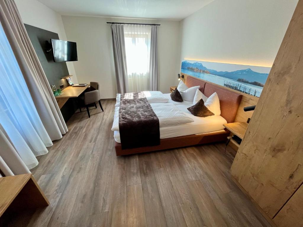 Postel nebo postele na pokoji v ubytování Hotel Oberwirt