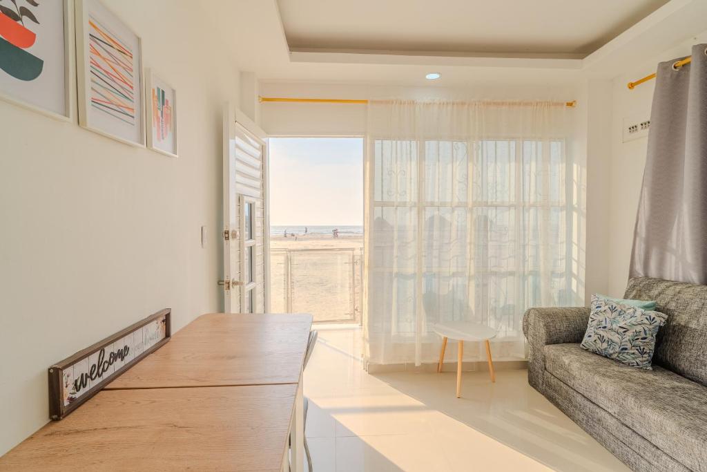 Posezení v ubytování Apartamentos el mochilero Rural frente a la playa B
