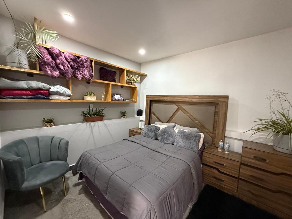 Postel nebo postele na pokoji v ubytování Suites vergel balcón