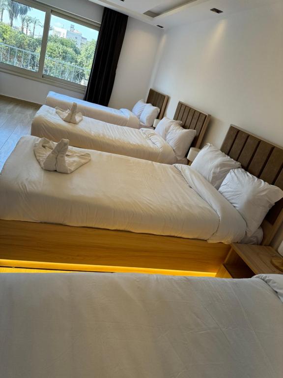 Letto o letti in una camera di The Platinum Pyramid view inn