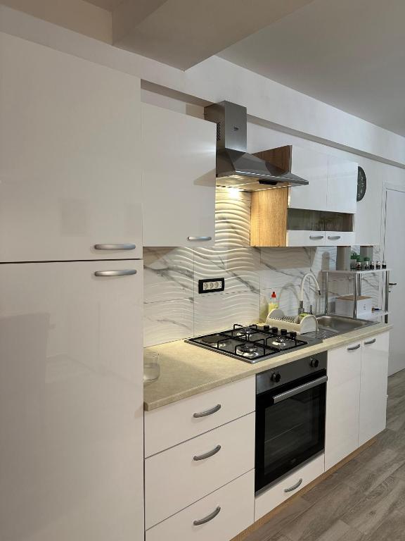 Kuchyňa alebo kuchynka v ubytovaní Apartmani Poljančić