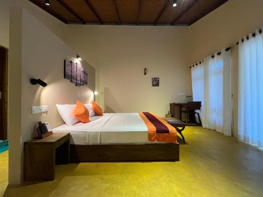 Postel nebo postele na pokoji v ubytování Cloud Nine Lanka Resort Wilpattu