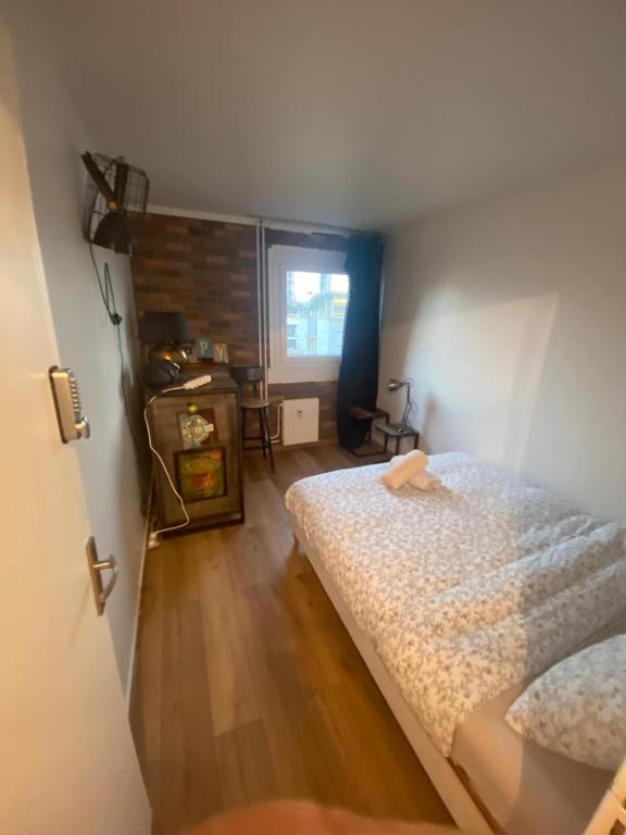 Postel nebo postele na pokoji v ubytování Liberté Room