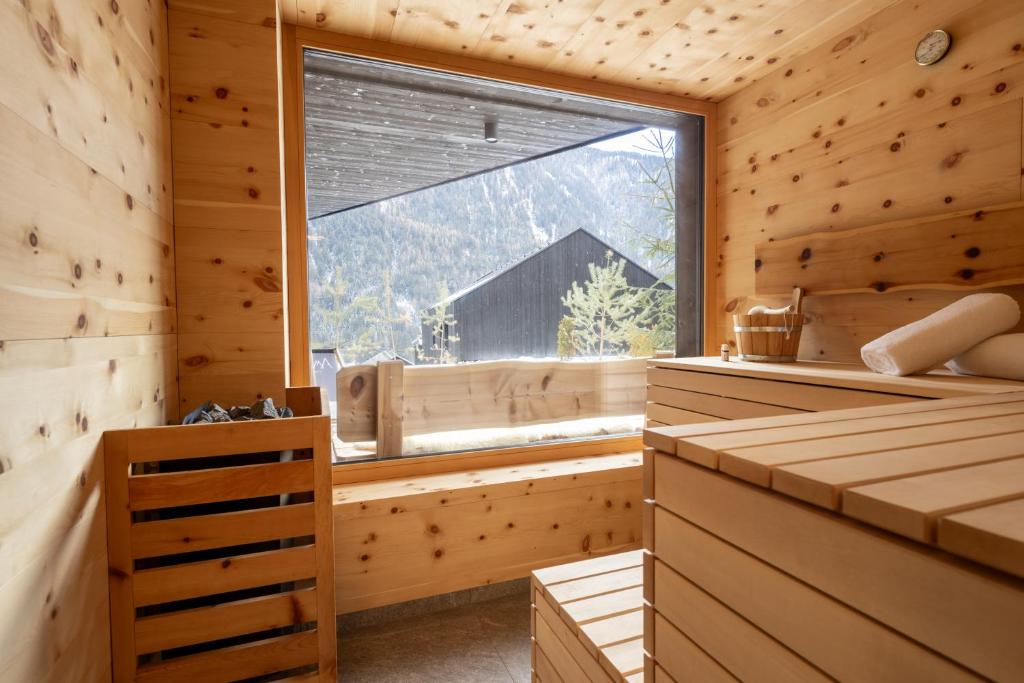 Posteľ alebo postele v izbe v ubytovaní Amus Chalets Dolomites - Luxury Chalets South Tyrol