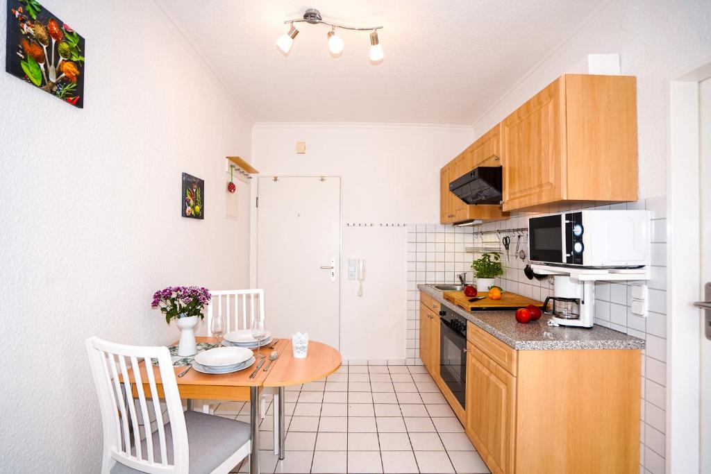 Kuchyň nebo kuchyňský kout v ubytování Gorch-Fock-Weg 11 Whg 2