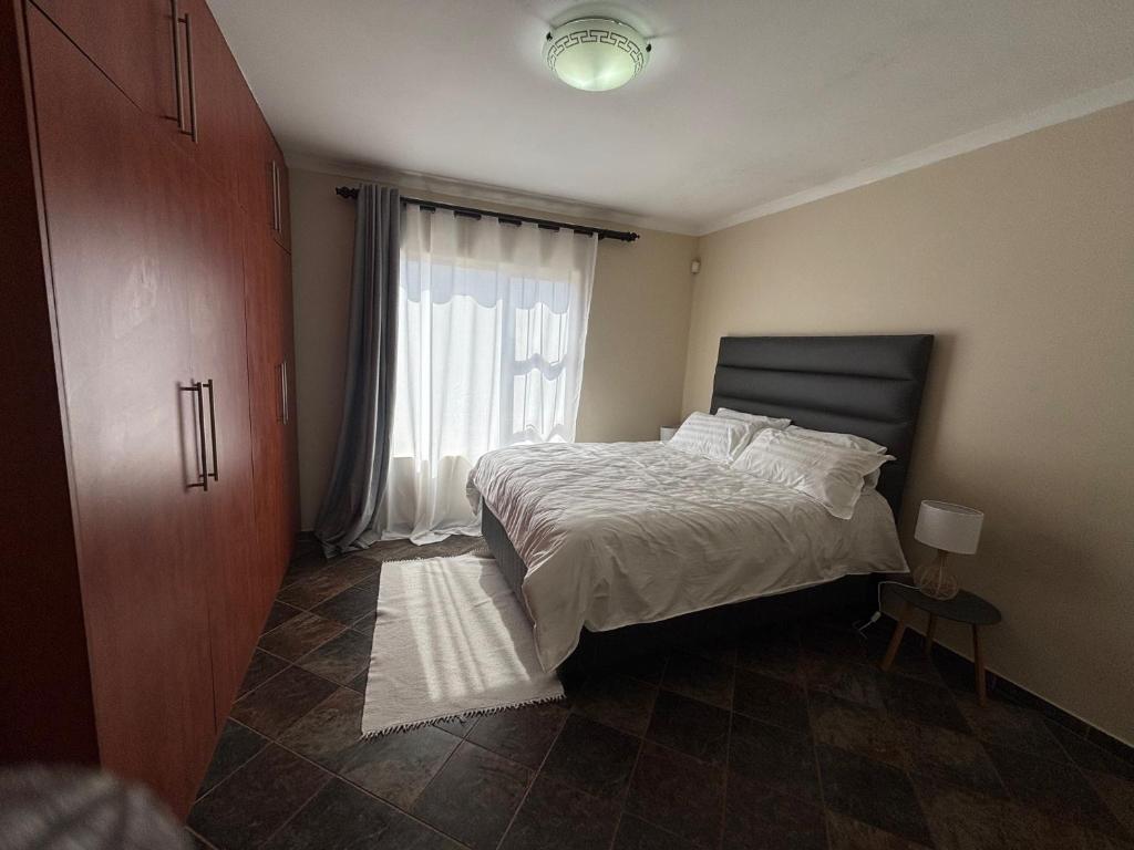 Llit o llits en una habitació de Kamegas