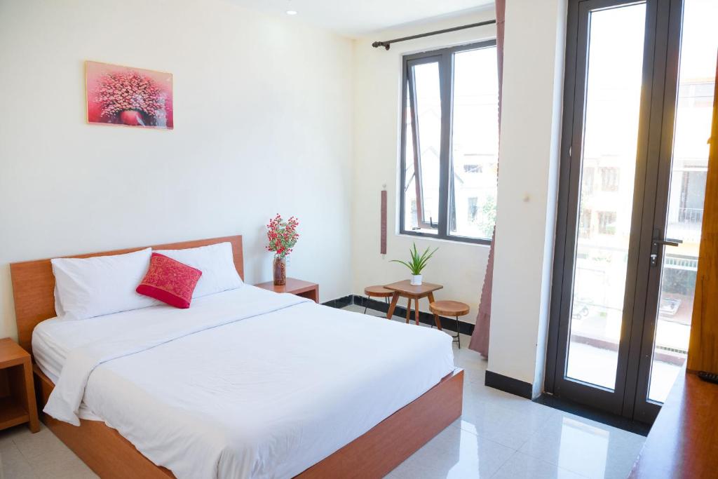 Giường trong phòng chung tại Gold Stone Hoi An Homestay