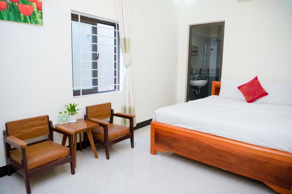 Giường trong phòng chung tại Gold Stone Hoi An Homestay