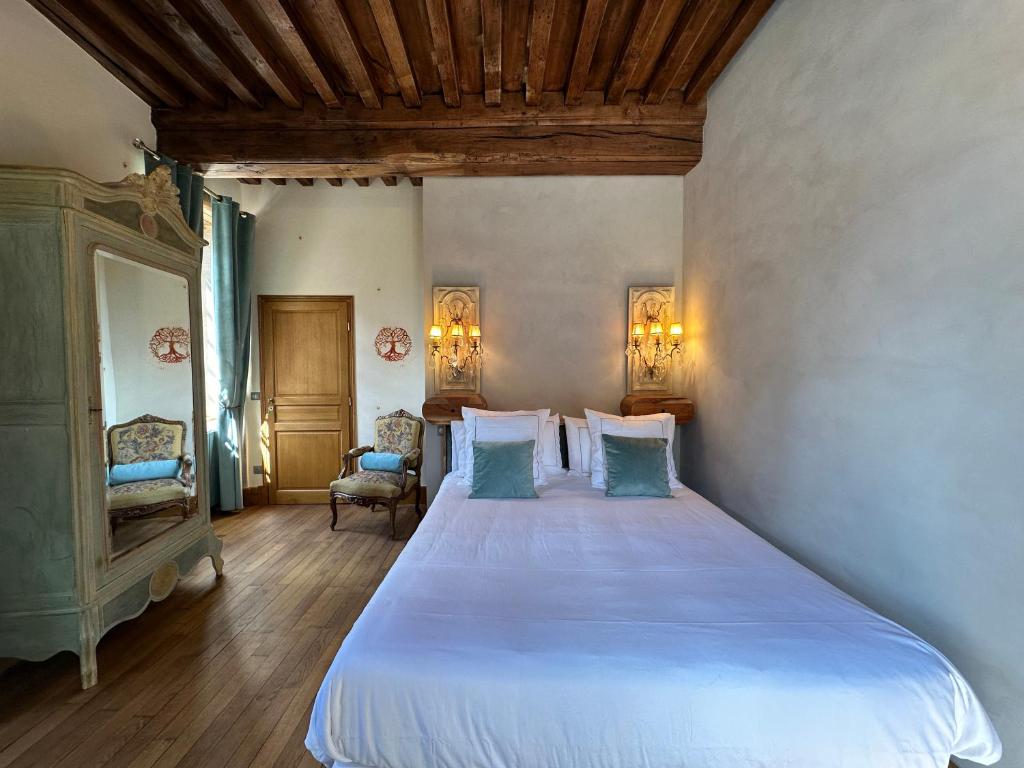 Postel nebo postele na pokoji v ubytování Gite, chambre d hôte L échoppe est belle