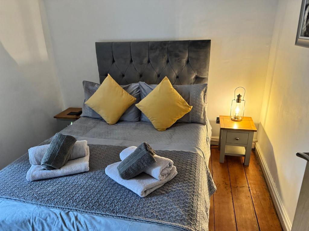 Postel nebo postele na pokoji v ubytování Abbey Cottage