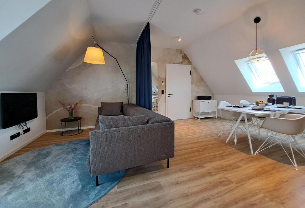 TV a/nebo společenská místnost v ubytování Eck am Meer 6