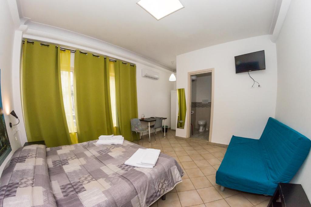 Postel nebo postele na pokoji v ubytování B&B Into Palermo Rooms