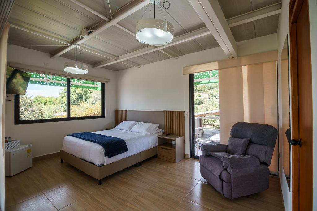 Postel nebo postele na pokoji v ubytování Finca Hotel 12 Palmas- Aeropuerto JMC