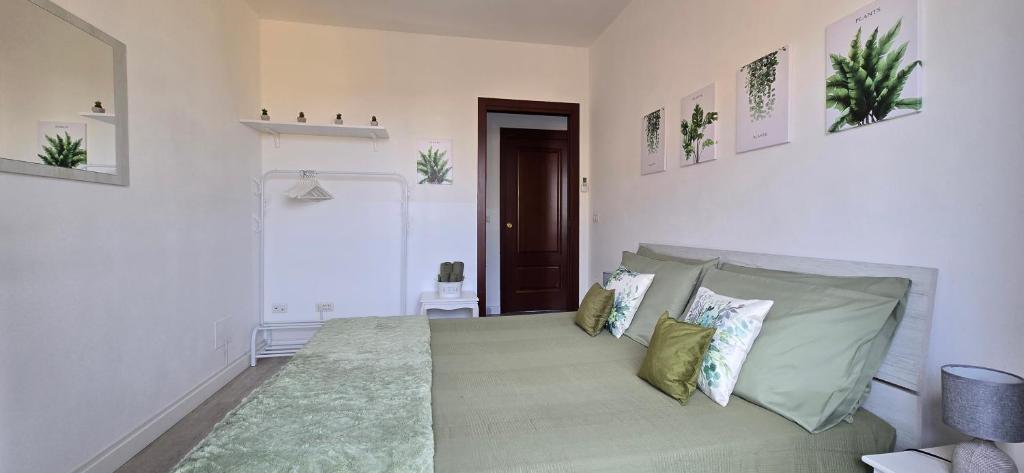 Posteľ alebo postele v izbe v ubytovaní Casa Rosy - Stanza privata con bagno esclusivo e parcheggio gratuito