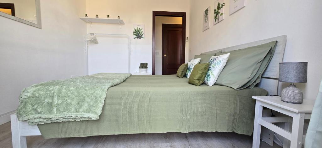 Posteľ alebo postele v izbe v ubytovaní Casa Rosy - Stanza privata con bagno esclusivo e parcheggio gratuito