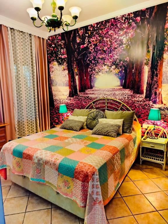 A bed or beds in a room at The Magic House