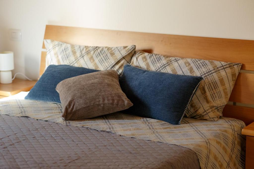Postel nebo postele na pokoji v ubytování Residenza Gli Agrumi del Garda