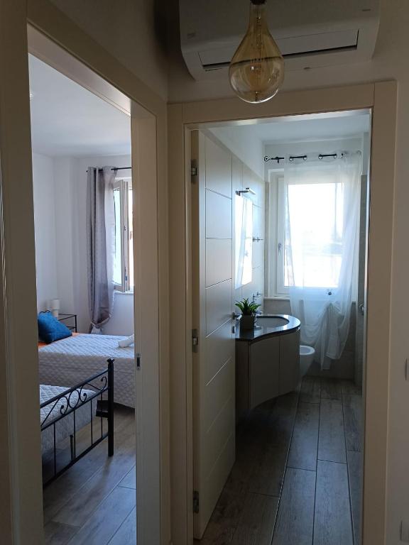 Postel nebo postele na pokoji v ubytování Residenza Gli Agrumi del Garda