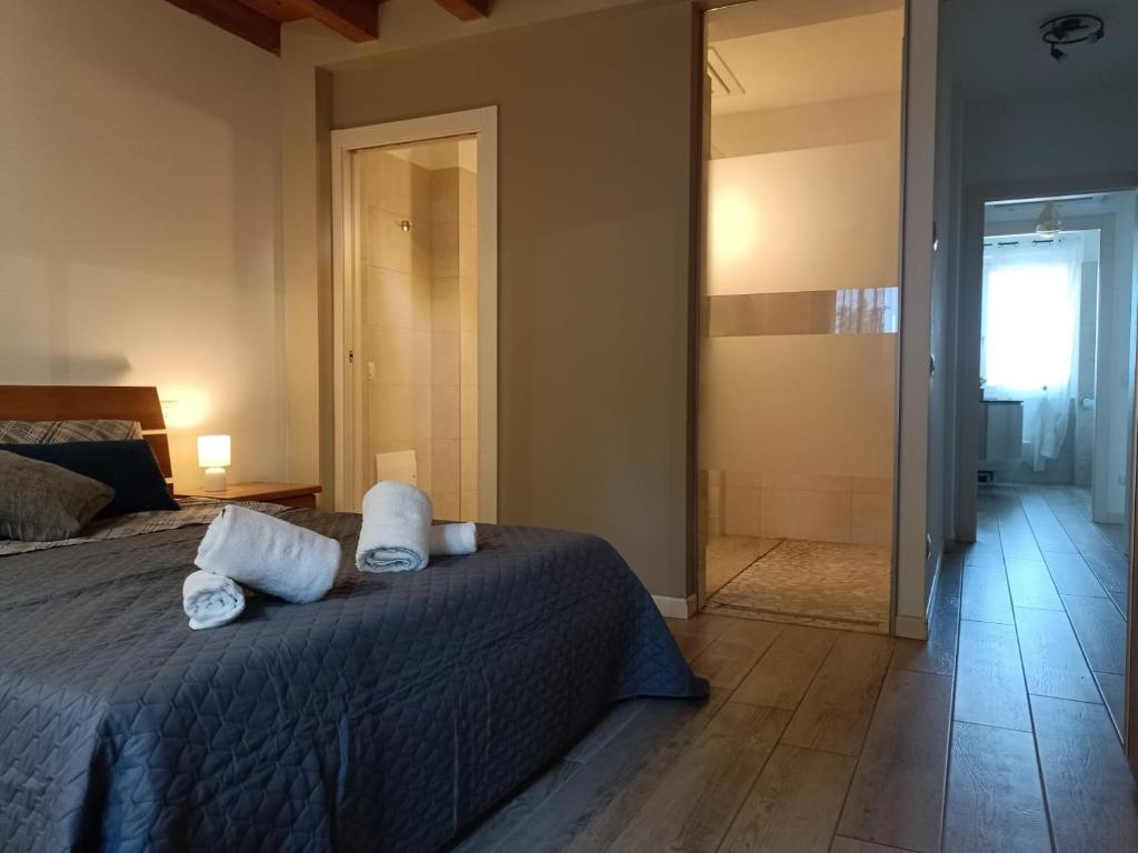 Postel nebo postele na pokoji v ubytování Residenza Gli Agrumi del Garda