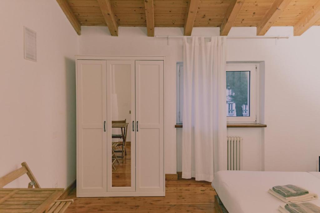 A bed or beds in a room at CA11 - Apartments