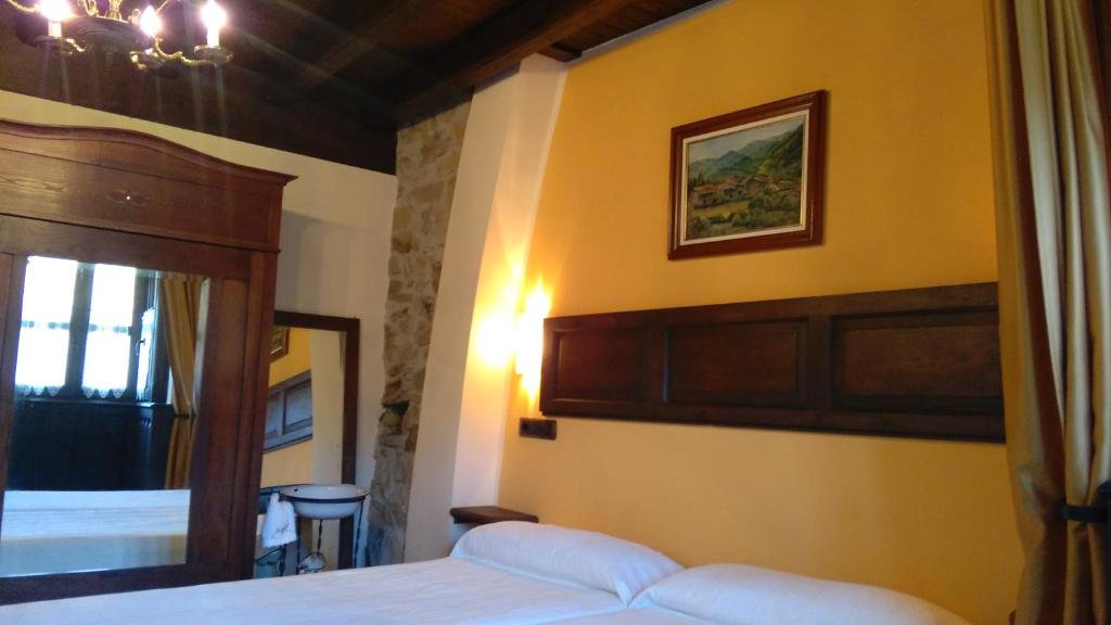 A bed or beds in a room at Casa de Aldea El Torrexon