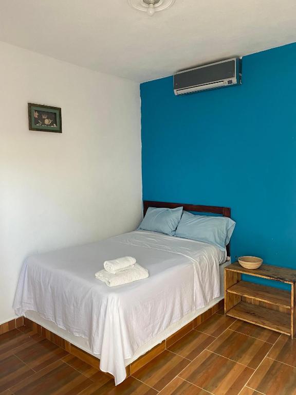 Postel nebo postele na pokoji v ubytování Hotel El Encanto