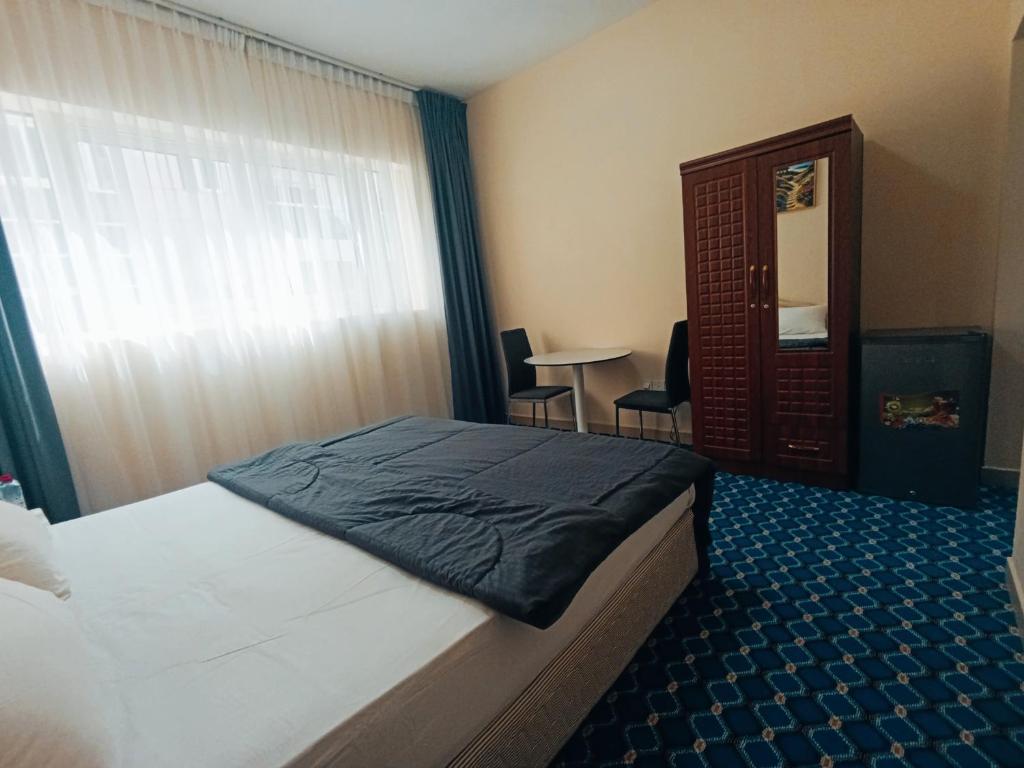 Postel nebo postele na pokoji v ubytování Yasmeen Suite Rooms