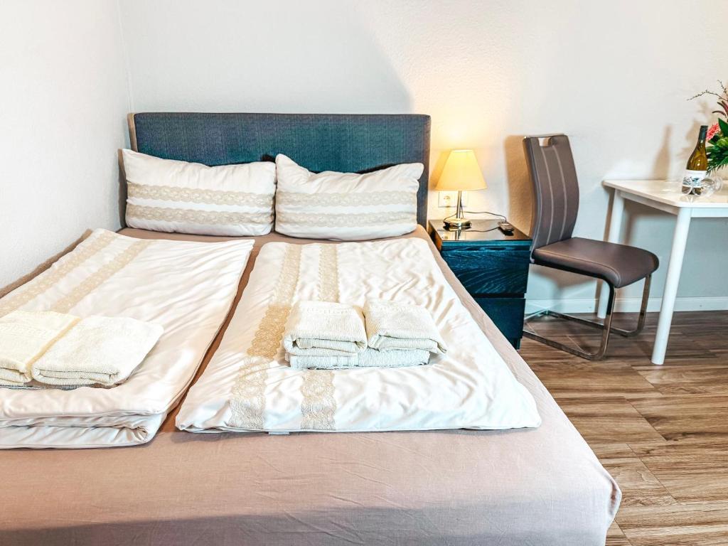 Postel nebo postele na pokoji v ubytování Haus Leuchtfeuer