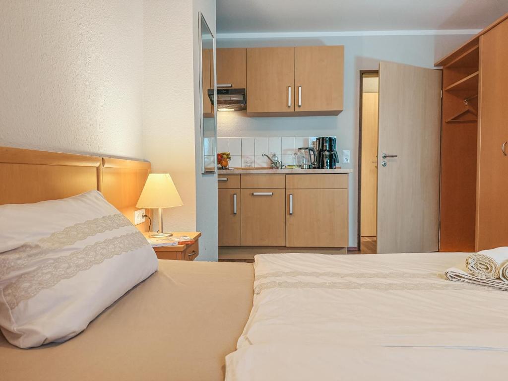 Postel nebo postele na pokoji v ubytování Haus Leuchtfeuer