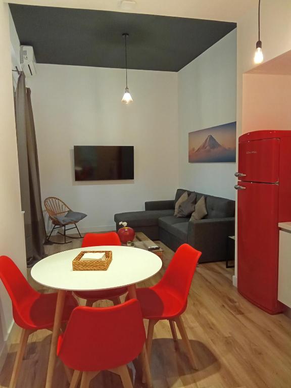 TV a/nebo společenská místnost v ubytování Sevilla deluxe suites