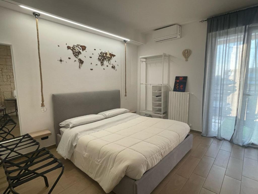 Postel nebo postele na pokoji v ubytování Wanderlust house