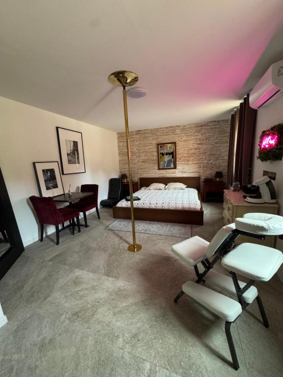 Ένα ή περισσότερα κρεβάτια σε δωμάτιο στο Chambre Master Parisienne