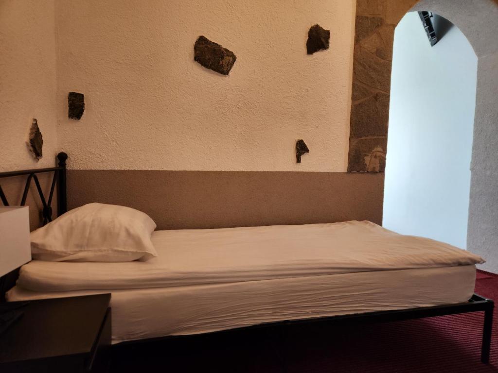 Postel nebo postele na pokoji v ubytování Pension Knafel