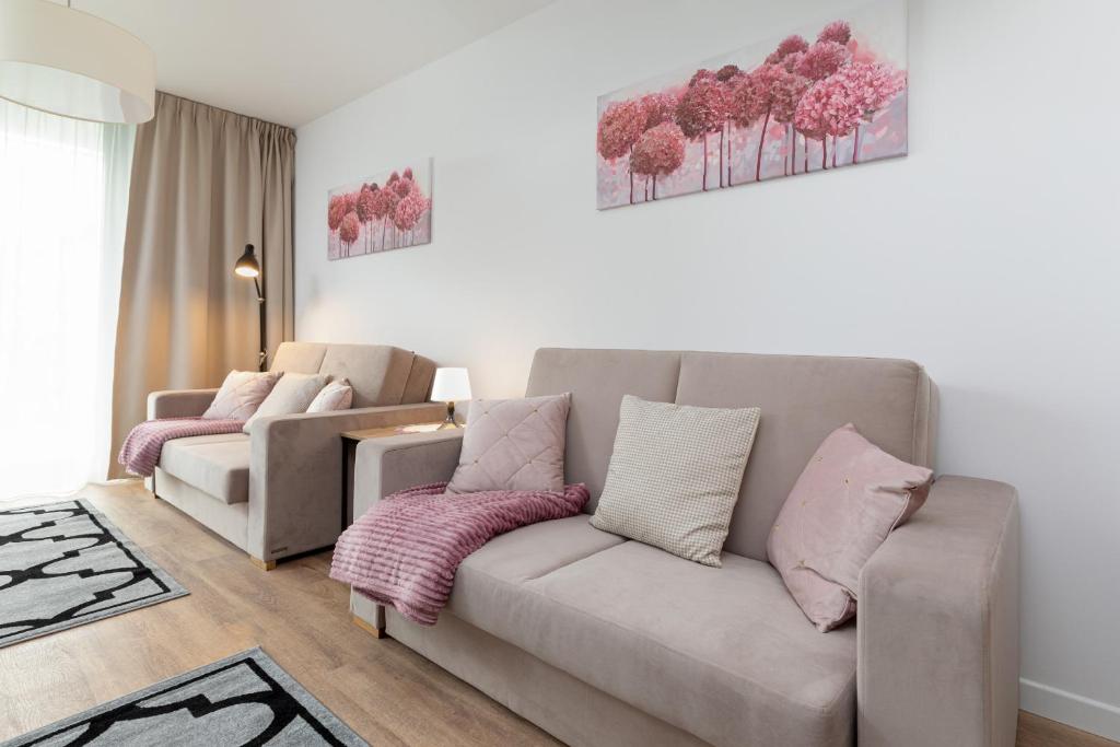 Χώρος καθιστικού στο Apartamenty Jantaris by Noclegi Renters