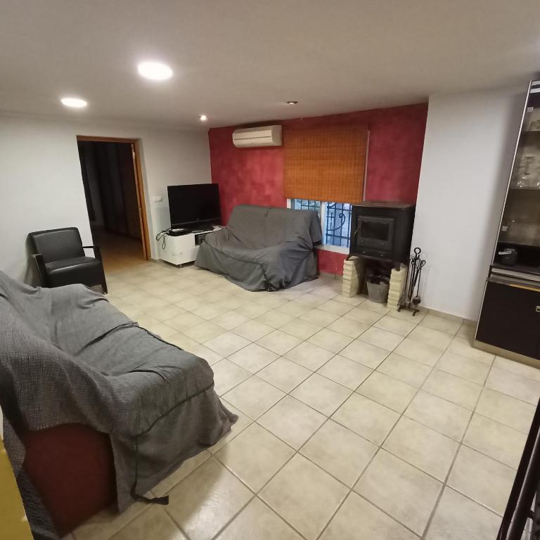 TV a/nebo společenská místnost v ubytování Chalet con piscina LUA HOME