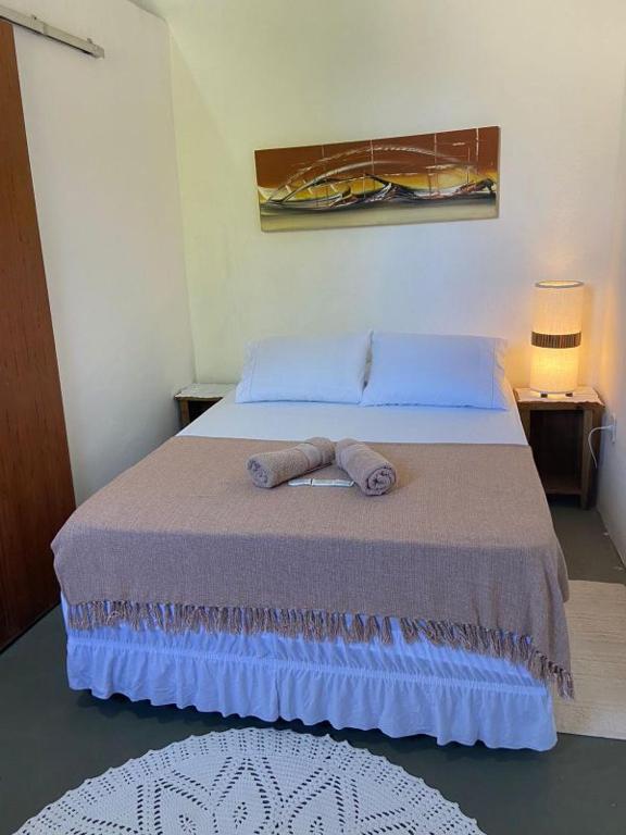 Postel nebo postele na pokoji v ubytování Pousada Dom Quixote